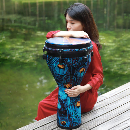 This Stunning Art Djembe Drum African Drum with Drum Bag is the art and music lover's dream come true. Incredible hand painted designs on frosted drum combine to create powerful sound. You will love this drum and it will enrich your life.. Available in 3 sizes and 6 different designs. Comes with a drum protector bag.